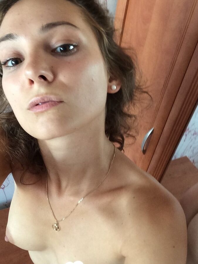 Cute teen loves her new closet with mirrors