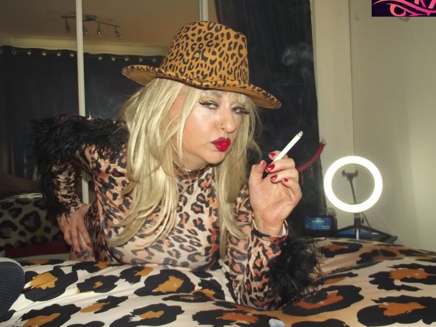 LEOPARED WHORE RETREATS TO THE BEDROOM