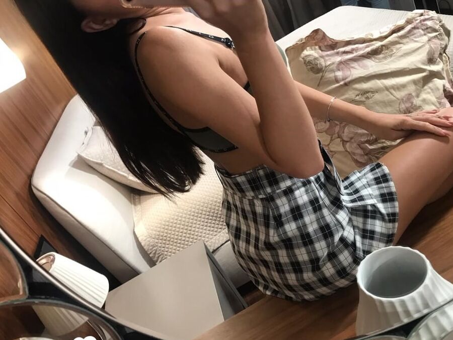 Hot schoolgirl reveals her tits in the mirror