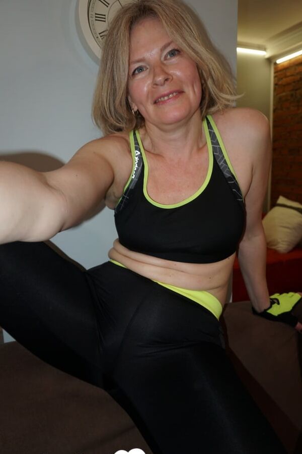 Blonde MILF loves trying out various stockings