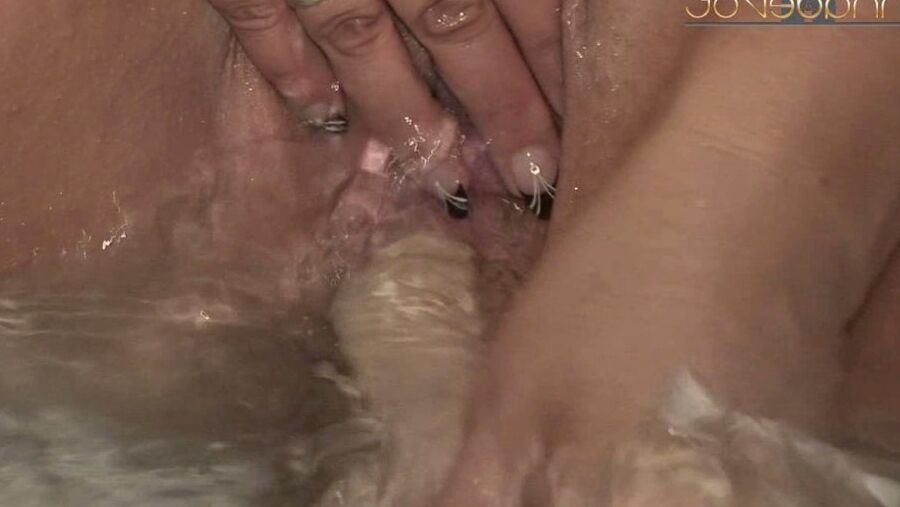 Double dildo in the bathtub
