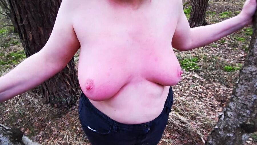 Titslapping in woods