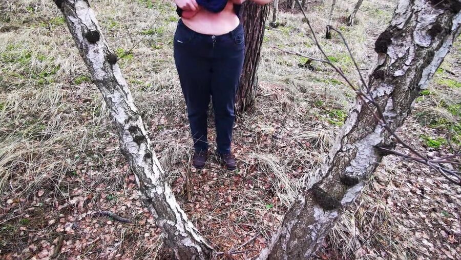 Titslapping in woods