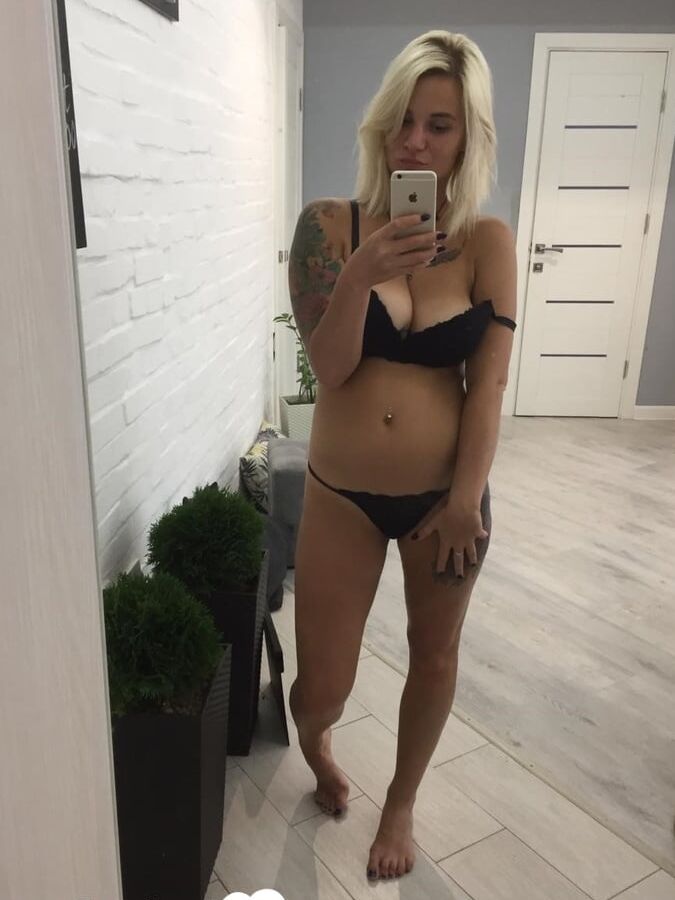 Horny blonde loves showing off her bust