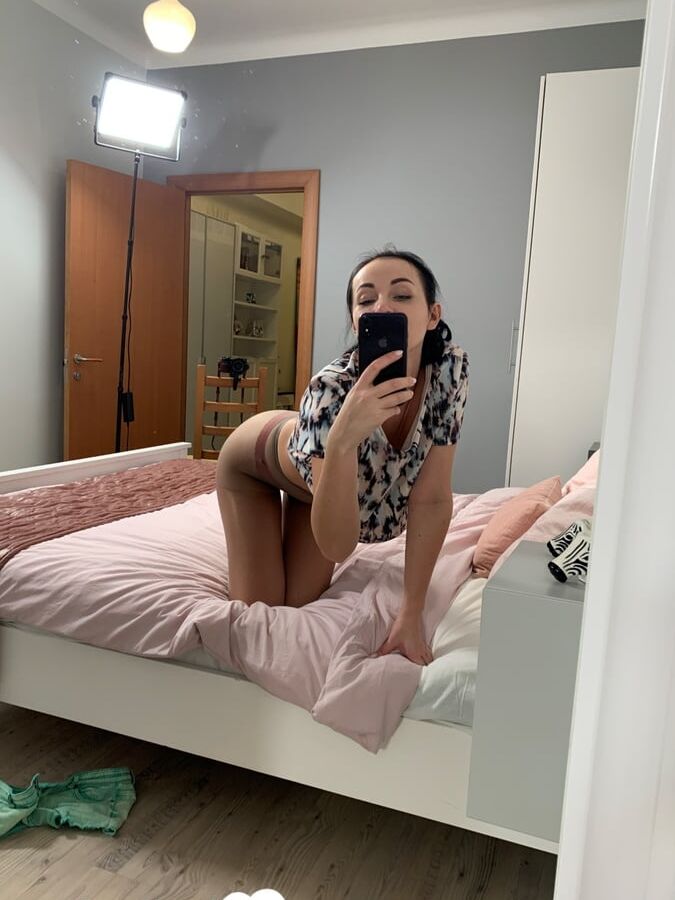 Hot teacher taking some selfies in her room