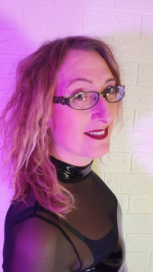 Black Shiny PVC Long bare Legs and Sexy Stilettos