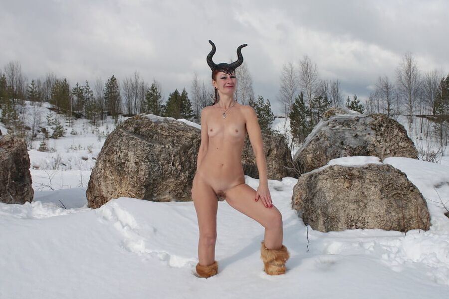 Naked on snow in quarry