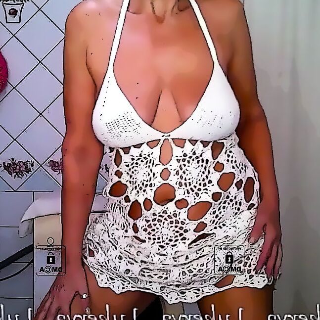Lukerya in an openwork white dress