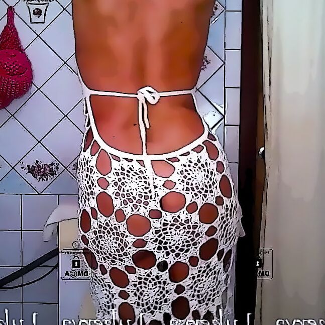 Lukerya in an openwork white dress