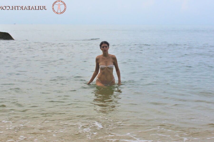 Part 5. Julia V Earth in white bikini at the beach.