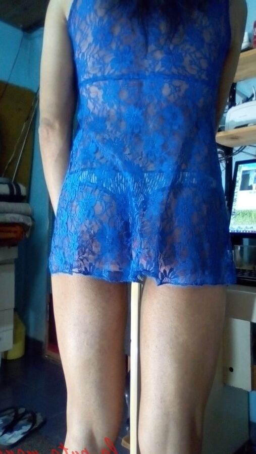 The whore maria wearing a blue dress