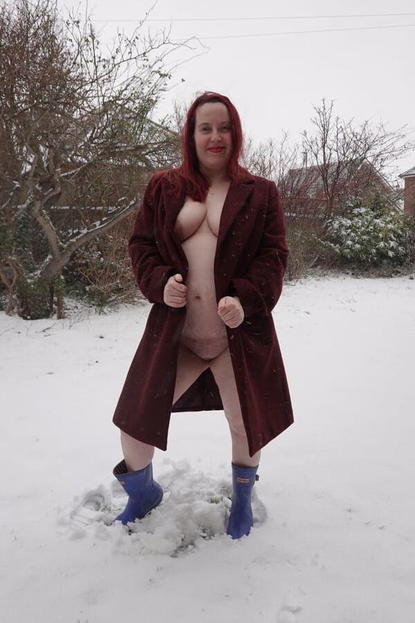 Pregnant flashing naked in the cold snow