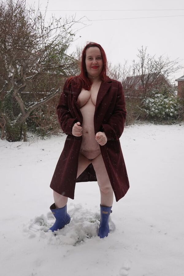Pregnant flashing naked in the cold snow