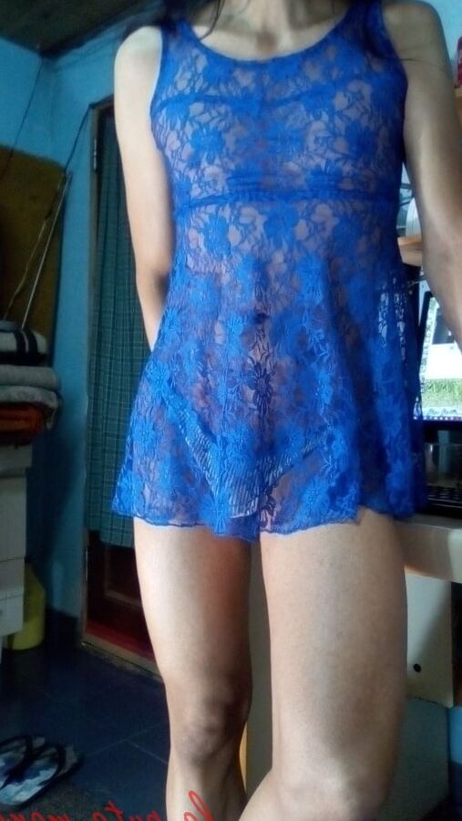 The whore maria wearing a blue dress