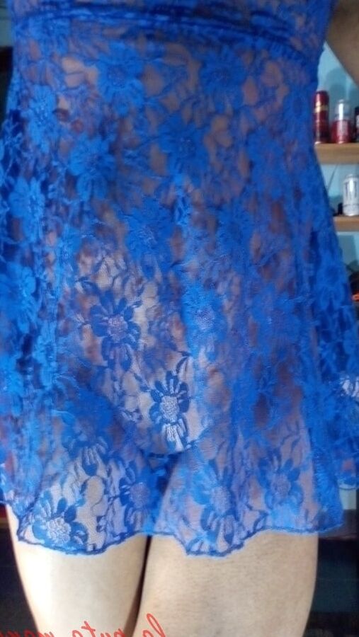 The whore maria wearing a blue dress