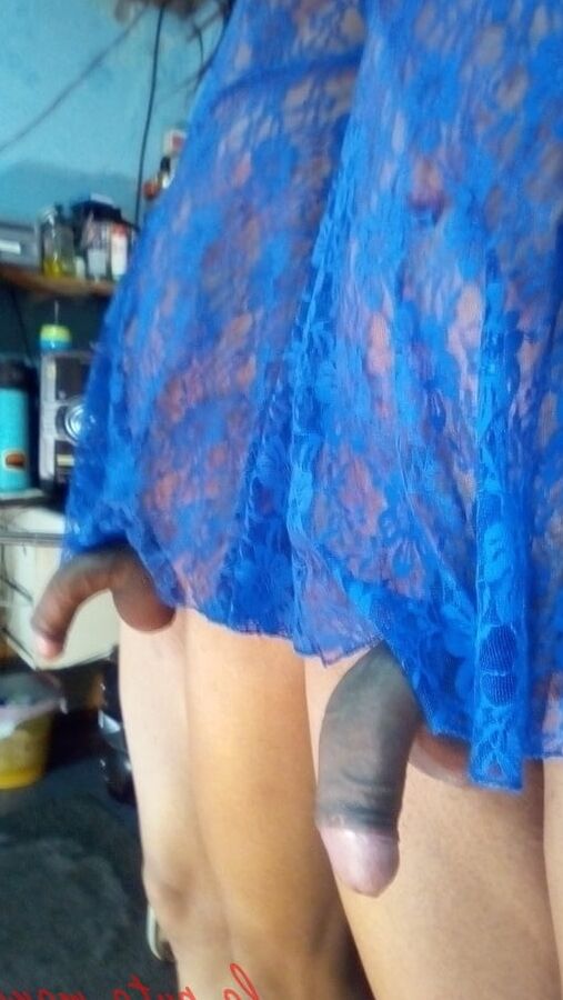 The whore maria wearing a blue dress