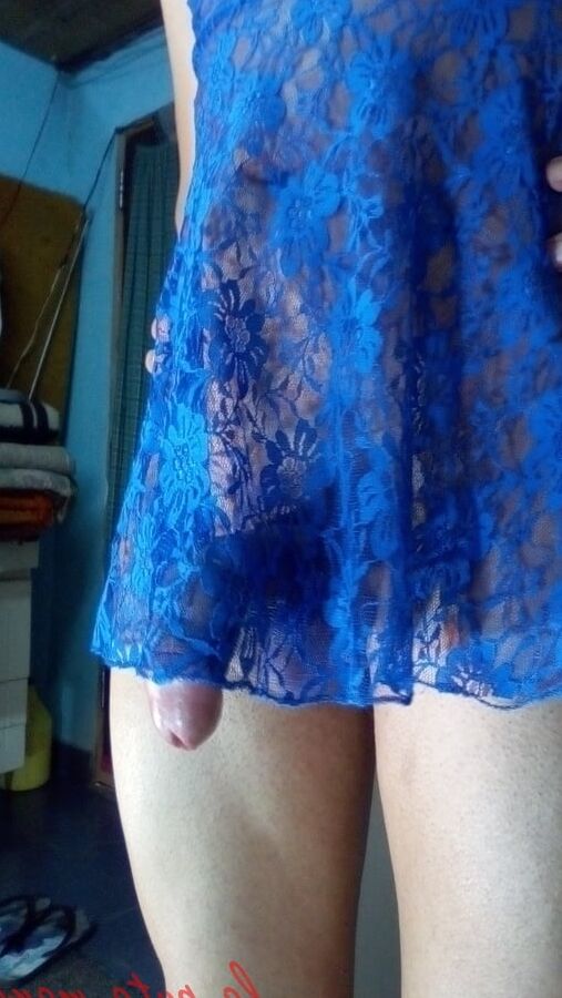 The whore maria wearing a blue dress