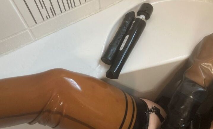 Latex and Dildo in Bath Tub