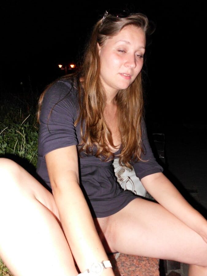 Horny brunette showing her naked body in public