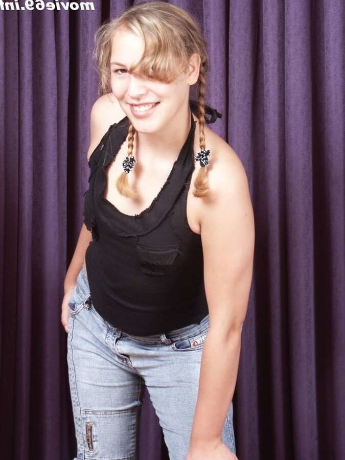Teen Nathalie poses topless with only jeans and high heels