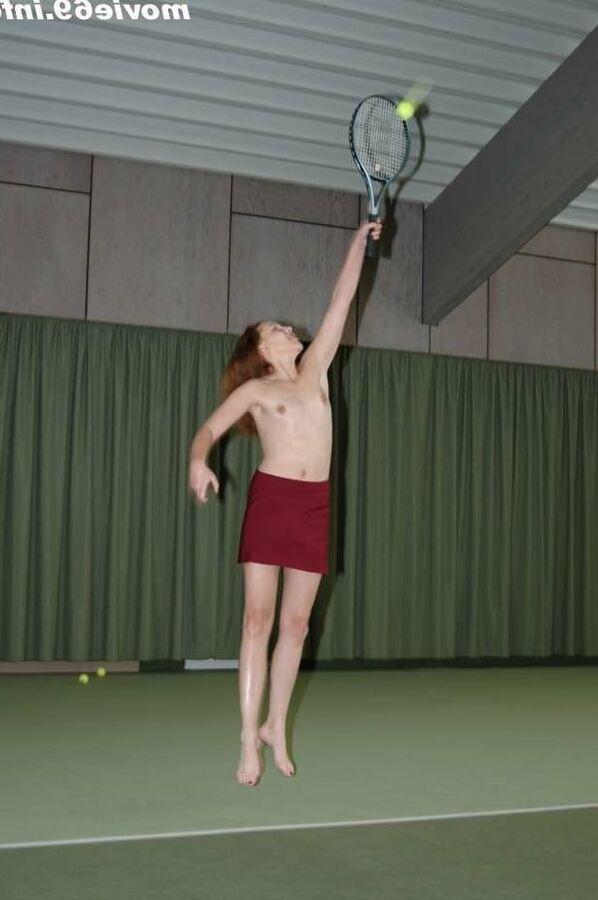 Nathalie plays naked tennis in a tennis hall