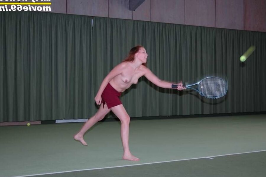 Nathalie plays naked tennis in a tennis hall