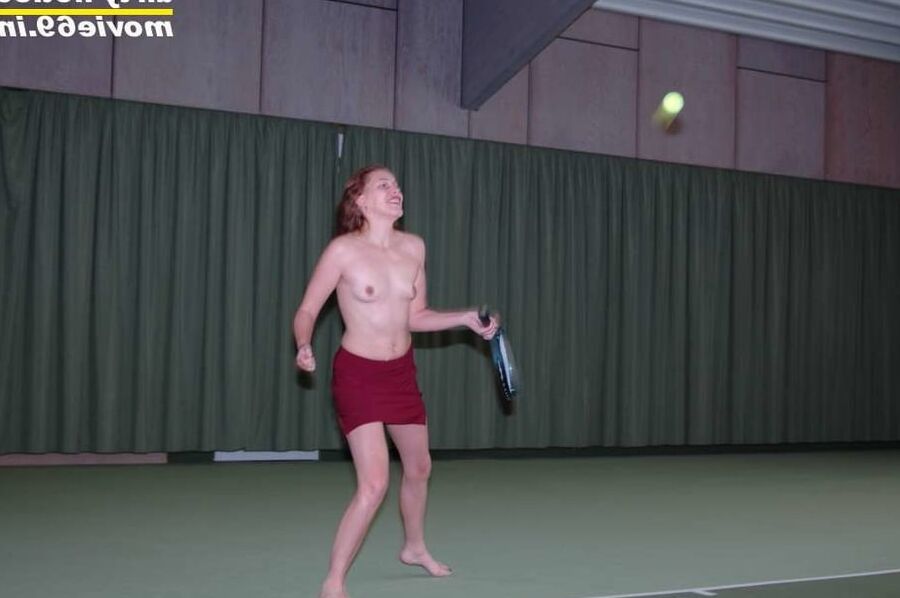 Nathalie plays naked tennis in a tennis hall
