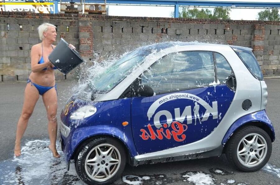 Jill Summer at the carwash in a bikini and topless