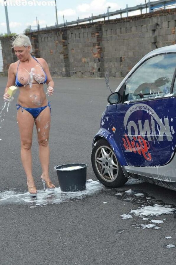 Jill Summer at the carwash in a bikini and topless