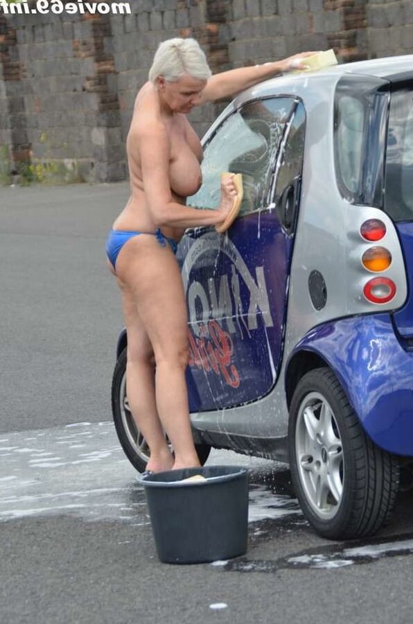 Jill Summer at the carwash in a bikini and topless