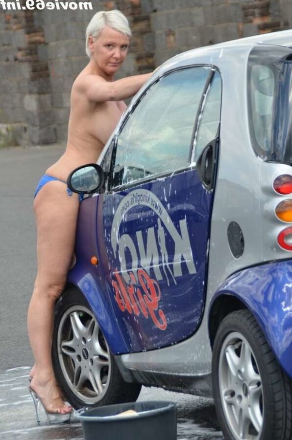 Jill Summer at the carwash in a bikini and topless