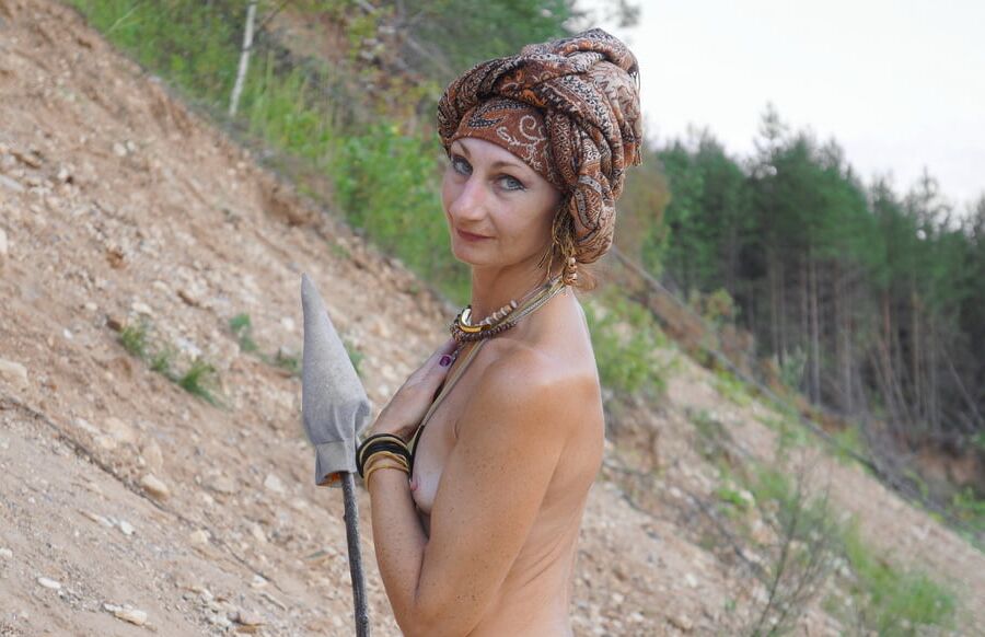 On a sandy slope with a spear