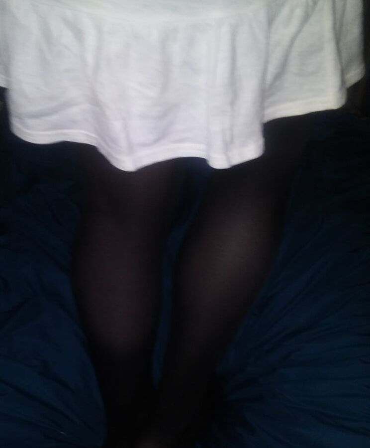 My systers black nylons and white skirt she wore yesterday