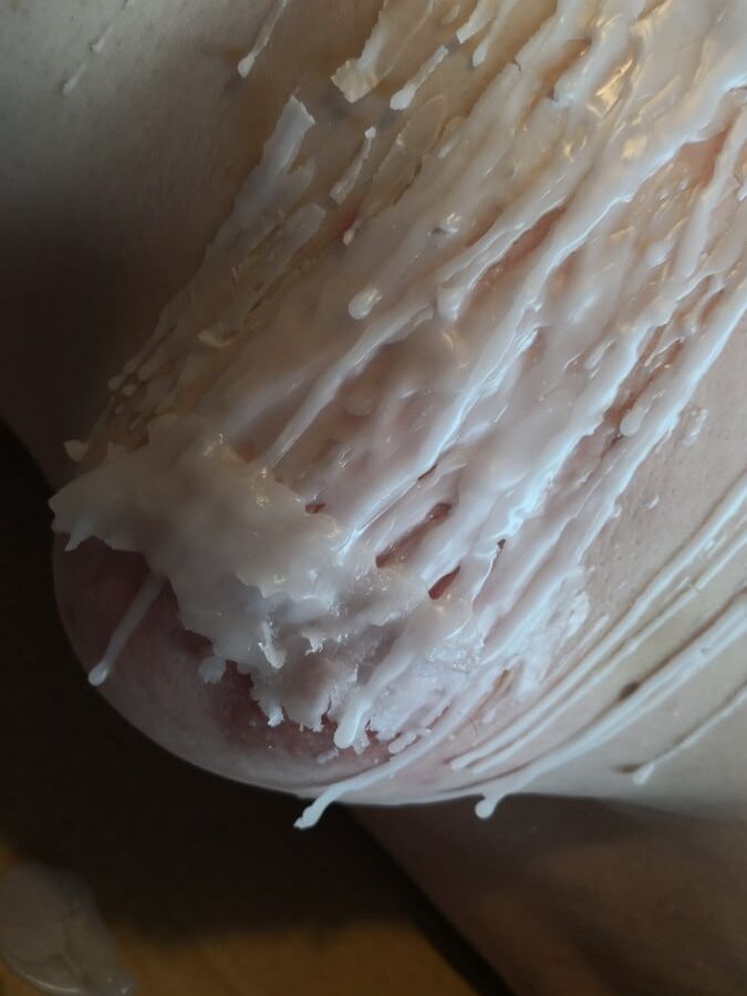 Breasts in hot wax