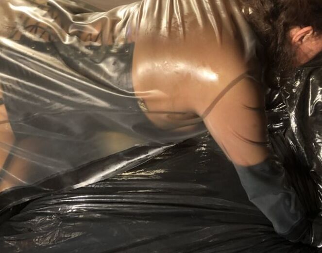 Latex and Dildos on Bed