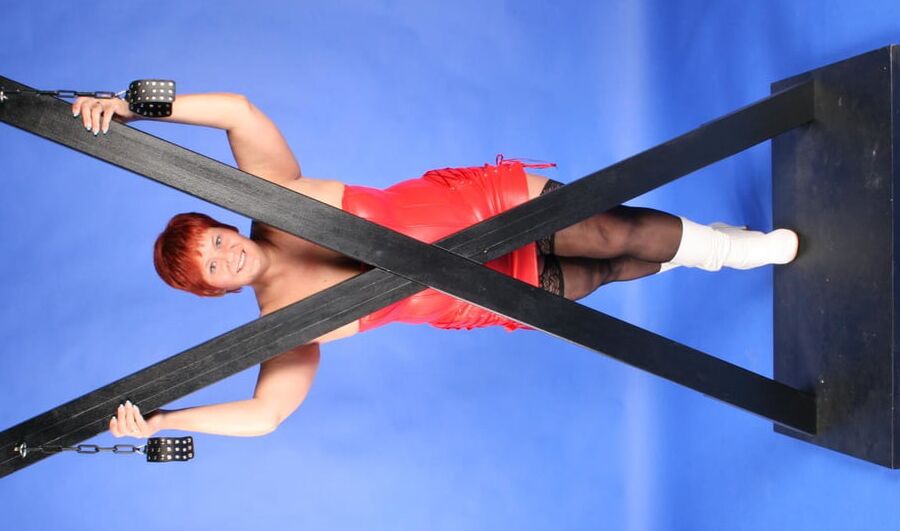 In red fetish outfit