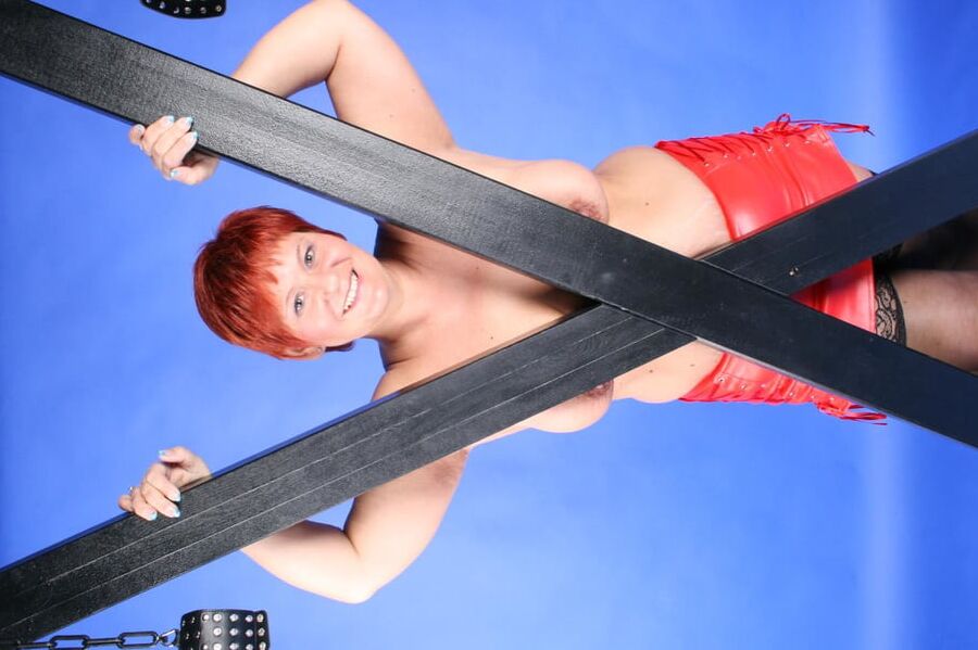 In red fetish outfit