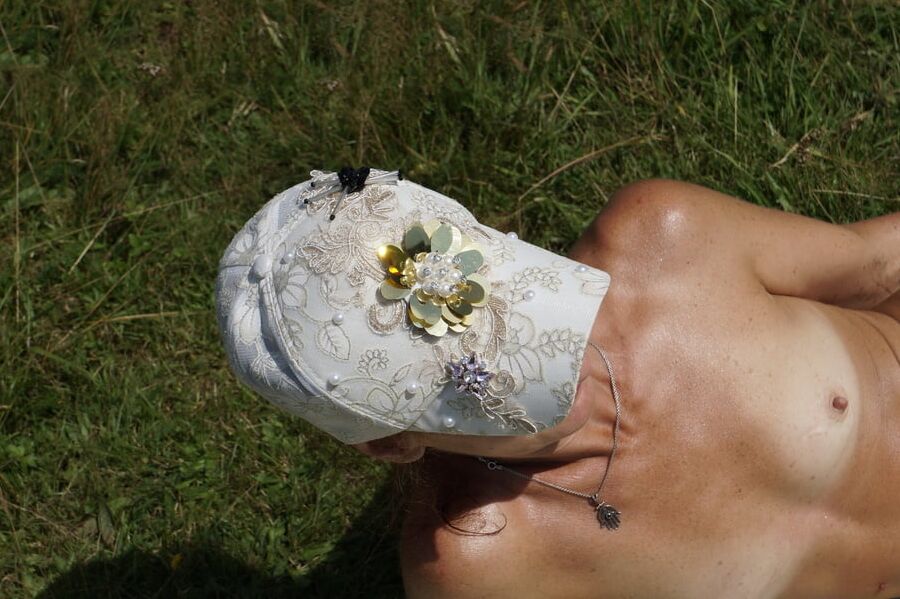 On the grass under sun