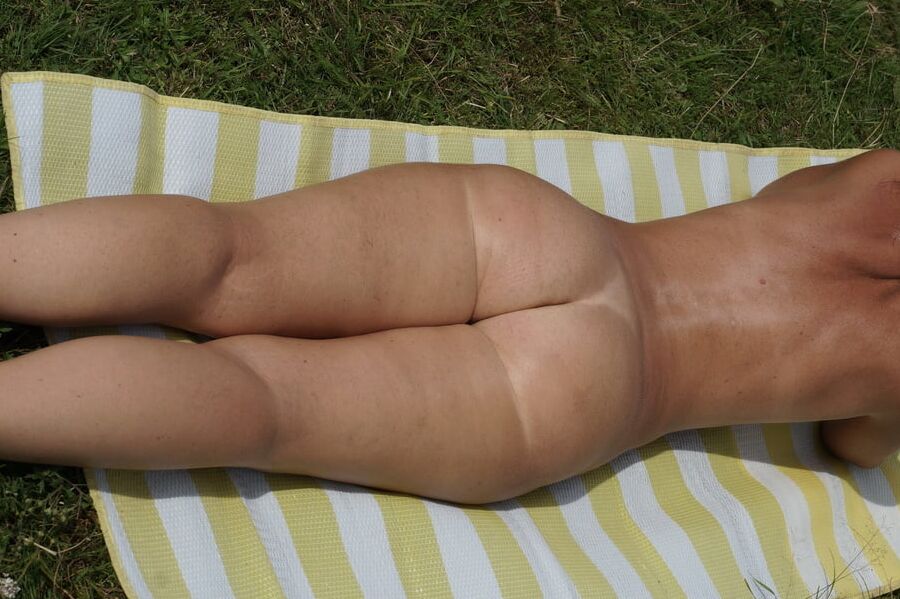 On the grass under sun