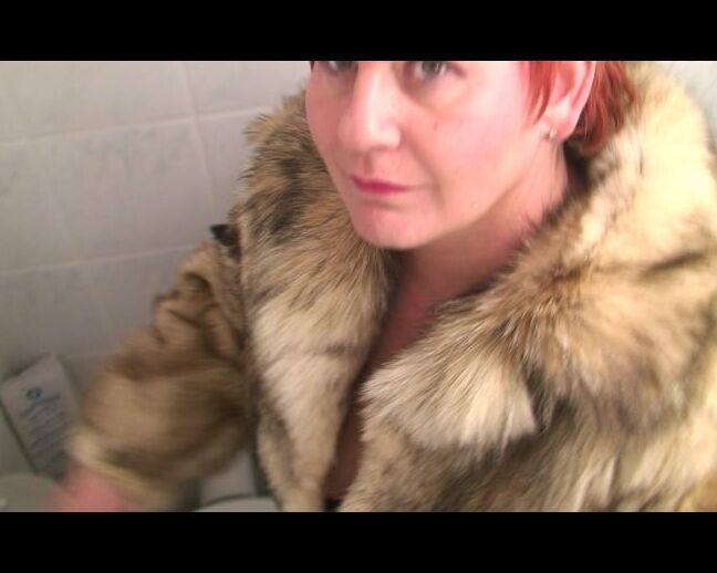 Secretly filmed in a fur coat