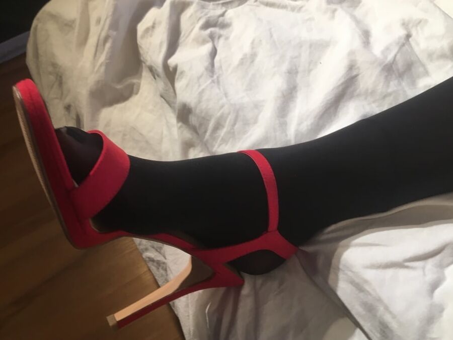 Nylon and Heels Play on Bed