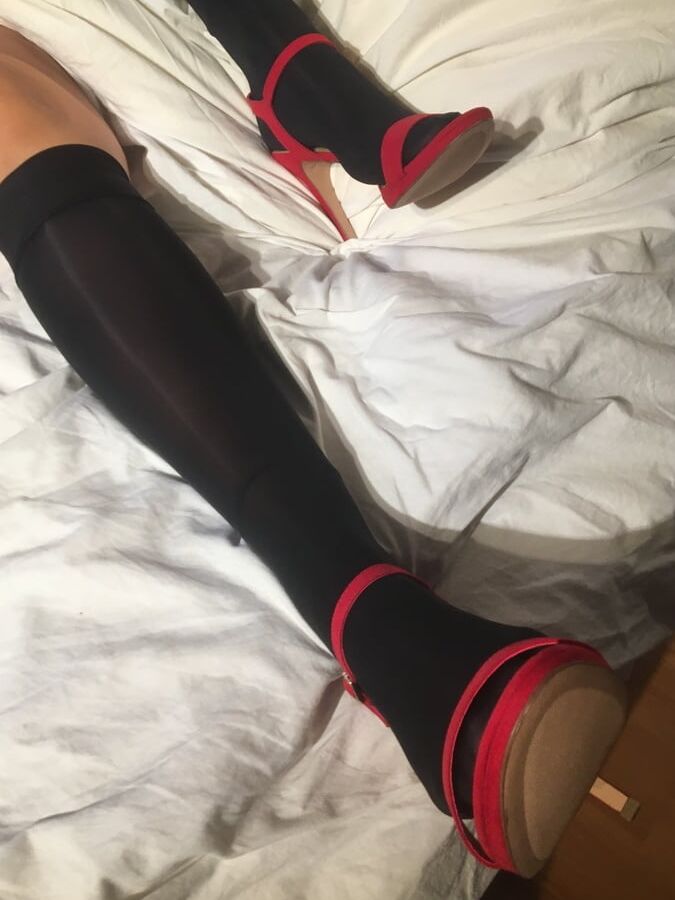 Nylon and Heels Play on Bed