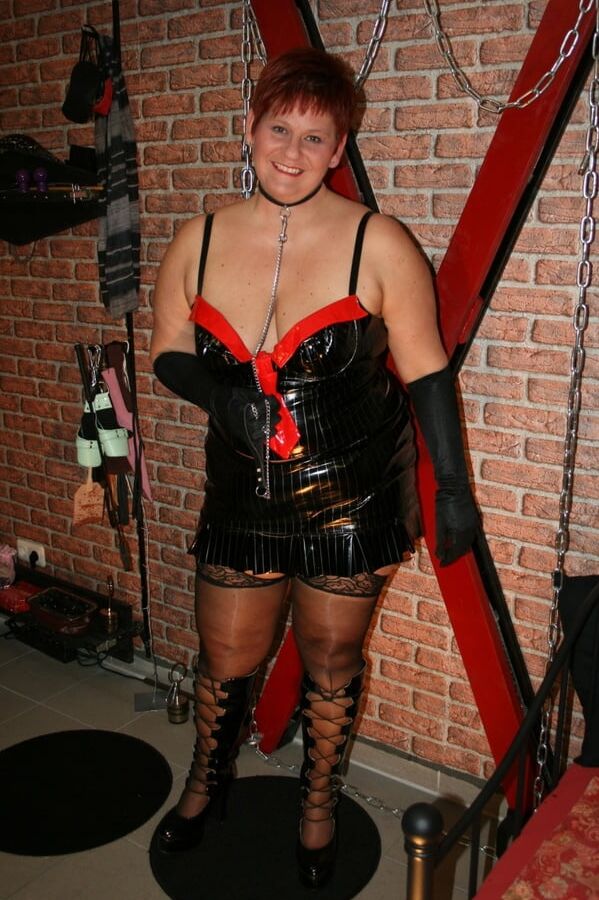 In latex paint outfit on the cross