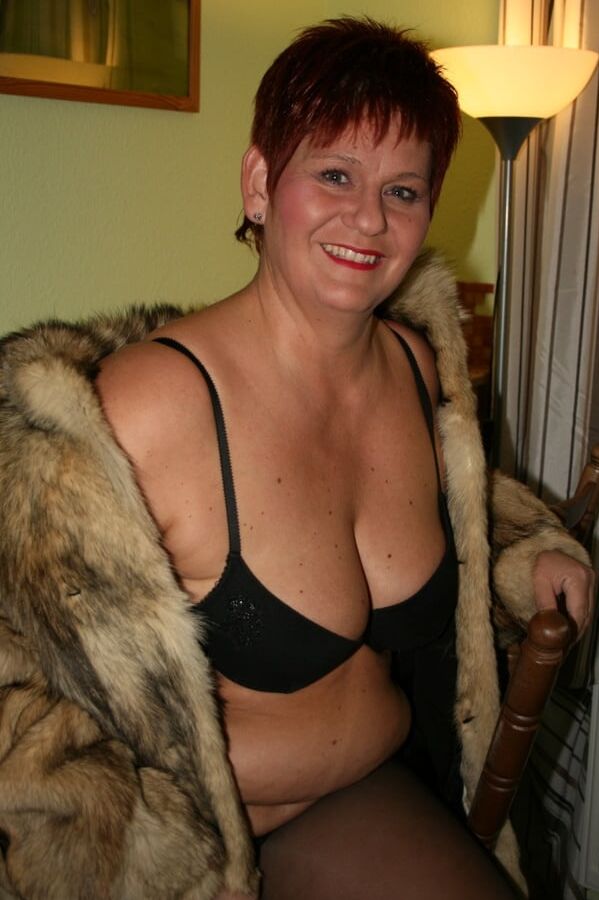 Posing in a brown fur jacket