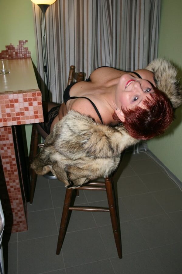 Posing in a brown fur jacket