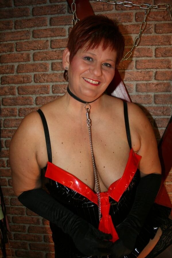 In latex paint outfit on the cross