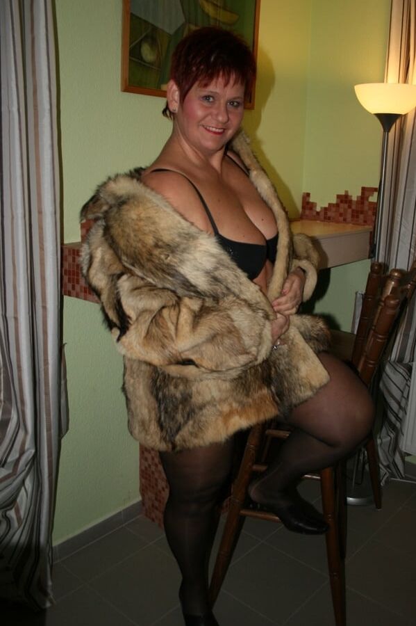 Posing in a brown fur jacket