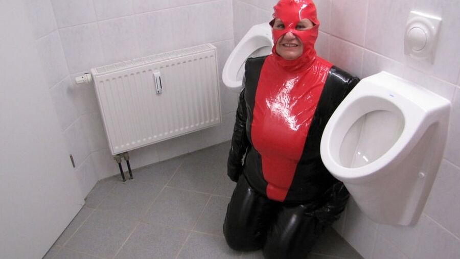Anna as a toilet in latex ...