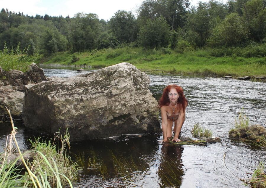 Near a boulder in the river