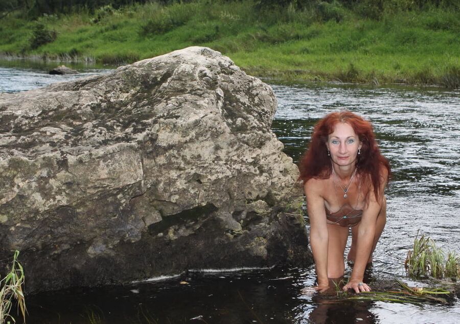 Near a boulder in the river